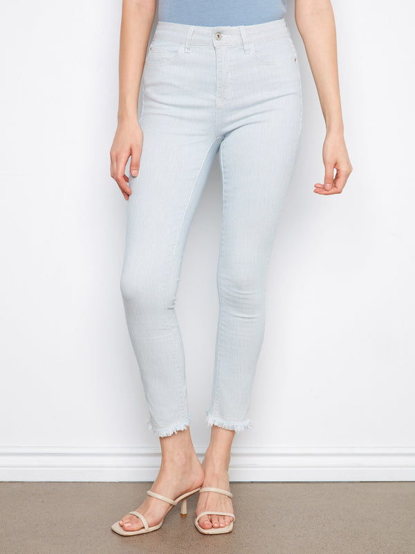 Ankle-length jeans featuring a chic frayed hemline. Ideal for pairing with heels or flats by Charlie B.