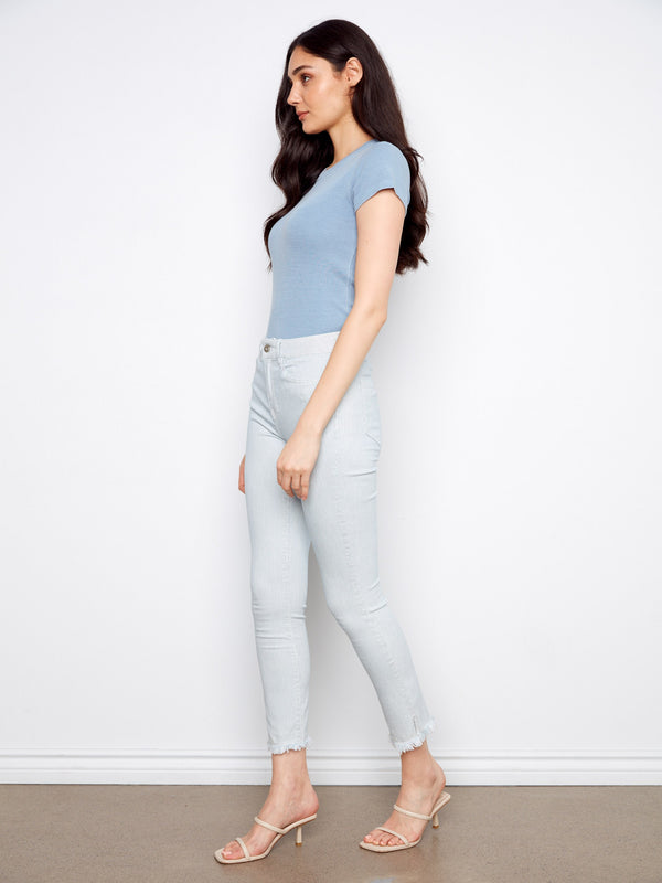 Stylish slit at the hem adds a touch of elegance to these versatile jeans by Charlie B.