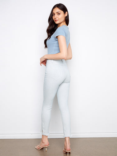 These jeans boast a subtle striped pattern, adding depth and style to your wardrobe by Charlie B.