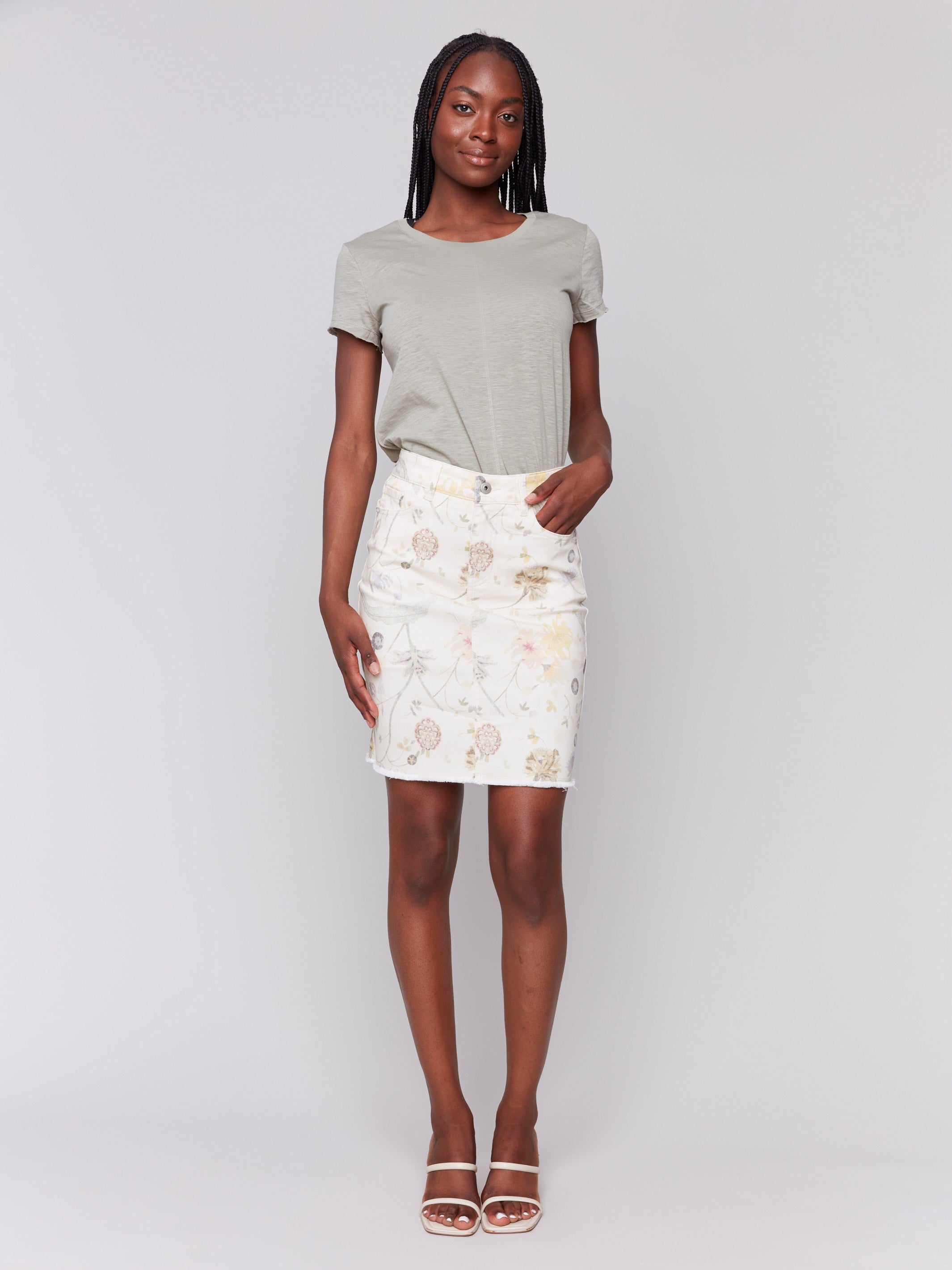 Stretch denim skort with built-in shorts for comfort by Charlie B.