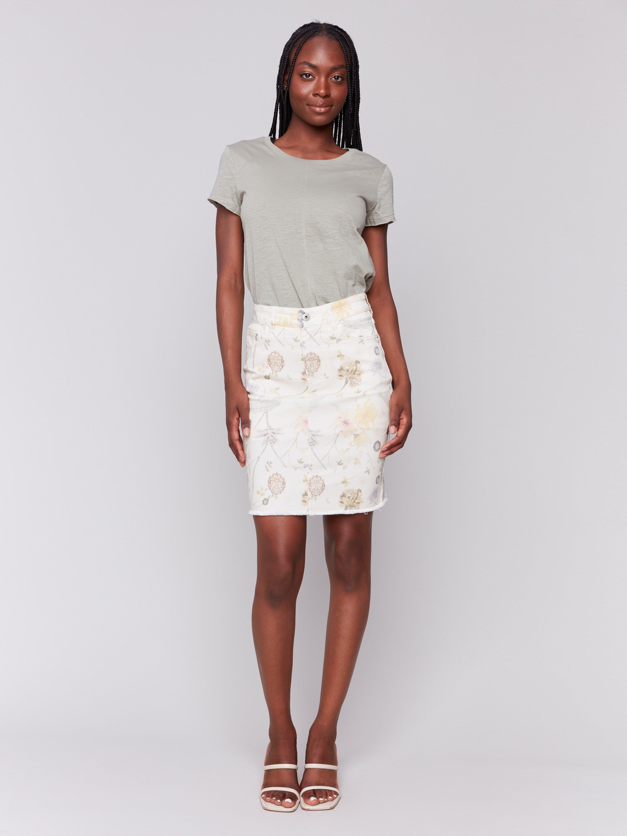 Slim fit skort crafted from stretch denim material by Charlie B.