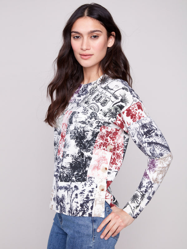 Sweater with an abstract Frame print, featuring a classic crew neck design and stylish side buttons by Charlie B.