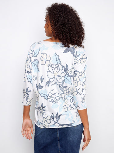 Casual elegance with this floral design top, complete with 3/4 sleeves for added style. By Charlie B.