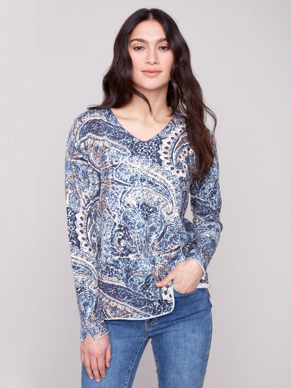Sweater with a plushy yarn texture and colorful paisley pattern, featuring long sleeves that offer warmth and style by Charlie B.