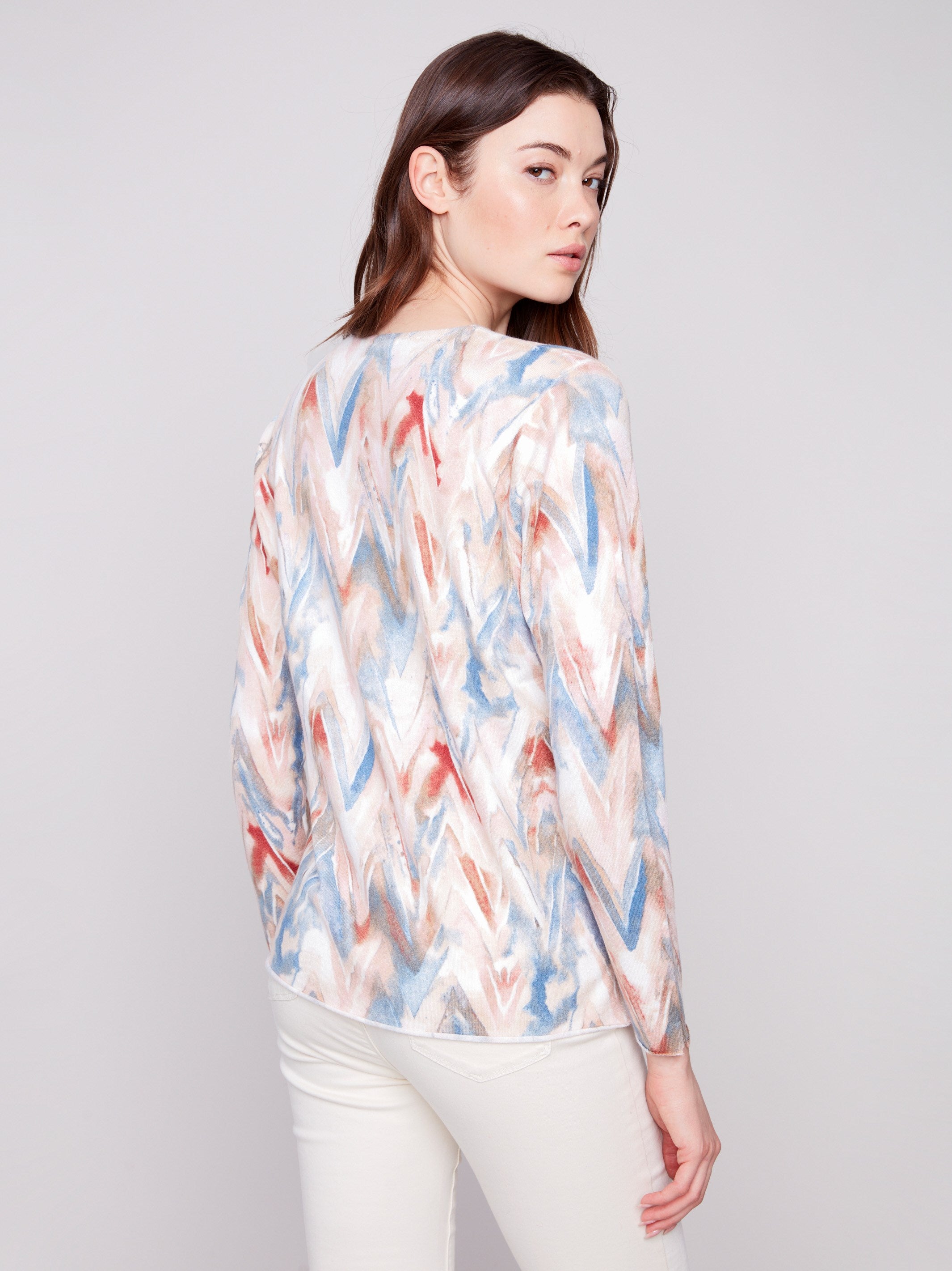 Chevron patterned sweater in plushy yarn with long sleeves, offering style and comfort by Charlie B.
