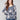 Sweater with a plushy yarn texture and colorful floral pattern, featuring long sleeves for added warmth by Charlie B.