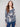 Sweater with a plushy yarn texture and colorful floral pattern, offering long sleeves for cozy wear on cool days by Charlie B.
