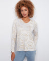 Sweater with side slits at cuffs and hem, featuring a delicate abstract print in soft hues by Charlie B.