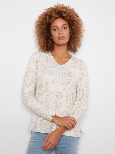 V-neck sweater with subtle side slits, adorned with intricate neutral patterns by Charlie B.