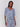 Blue top with geometric pattern and V-neck design by Charlie B.