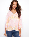 Floral top with wide 3/4 sleeves, showcasing a relaxed fit and intricate pattern. Designed for comfort and style by Charlie B.