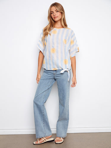 Lightweight fabric enhances the comfort of this striped dolman top with vibrant embroidery by Charlie B.