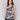 Black and white top with crew neckline, showcasing abstract botanical print by Charlie B.