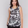 Black and white top with crew neckline, showcasing abstract botanical print by Charlie B.