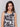 Abstract print top with button closure on keyhole back by Charlie B.