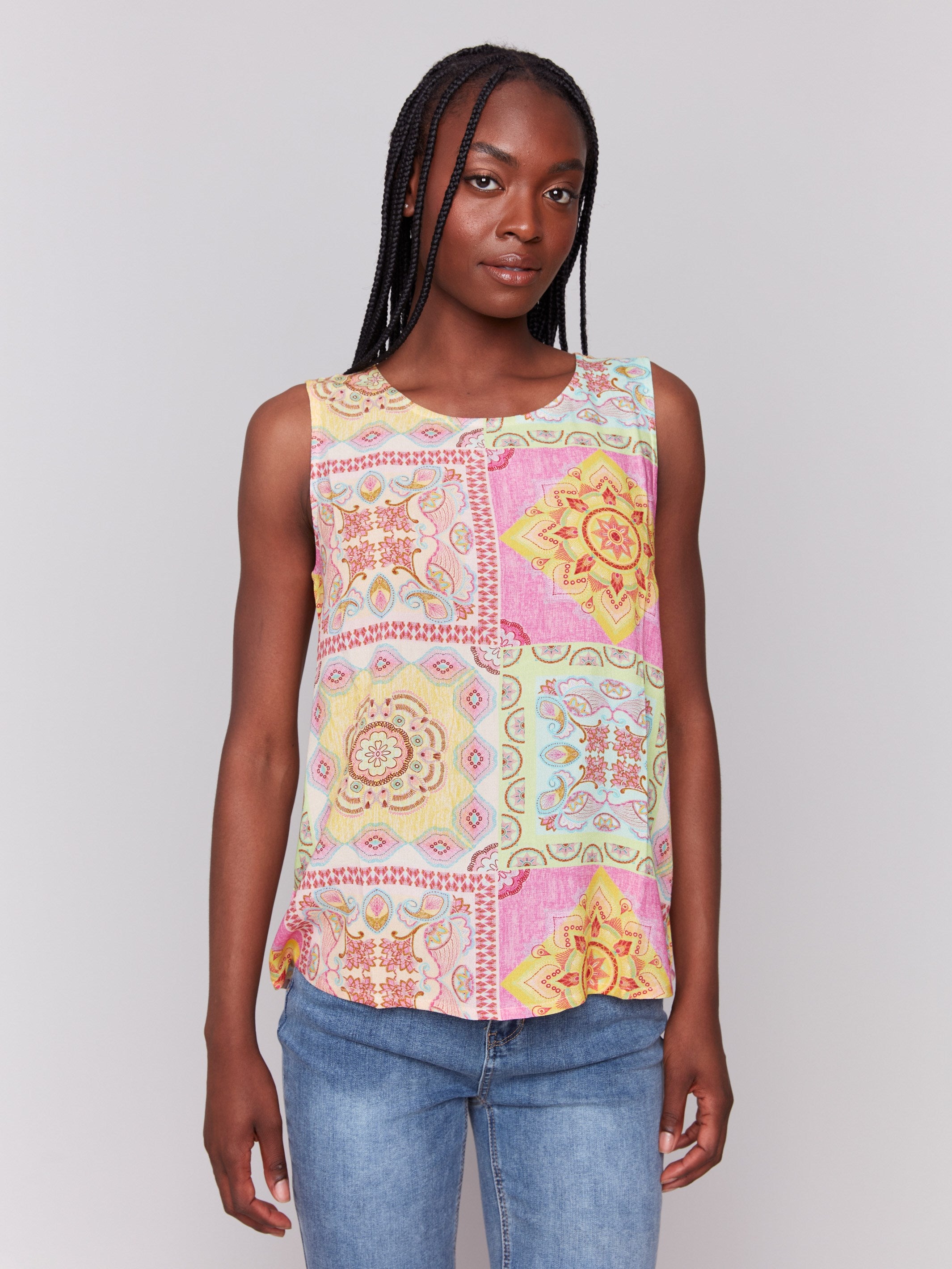 Geometric pattern top with a keyhole back and round neckline by Charlie B.