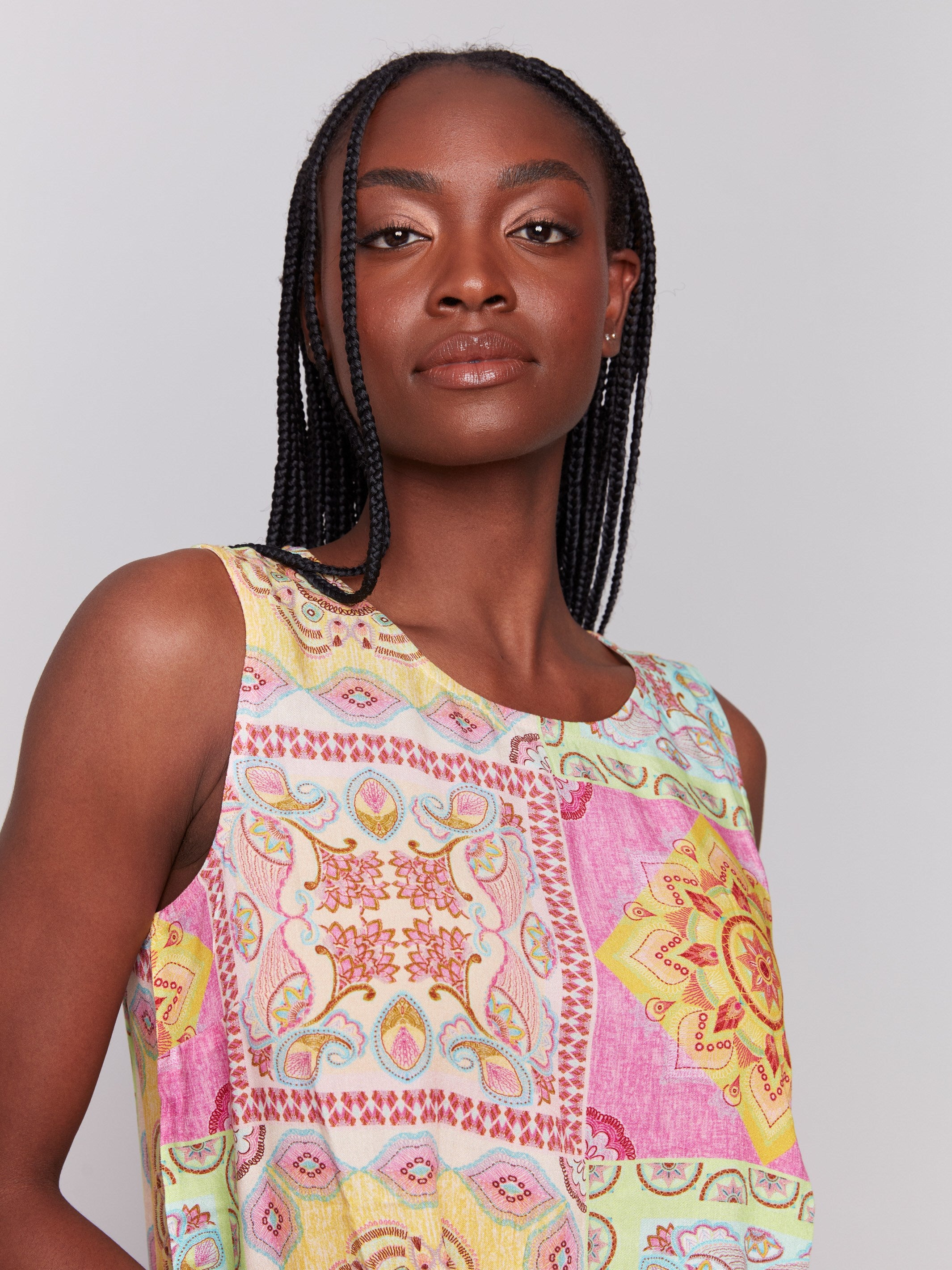 Sleeveless design with a crew neckline, showcasing vibrant prints by Charlie B.