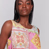Sleeveless design with a crew neckline, showcasing vibrant prints by Charlie B.