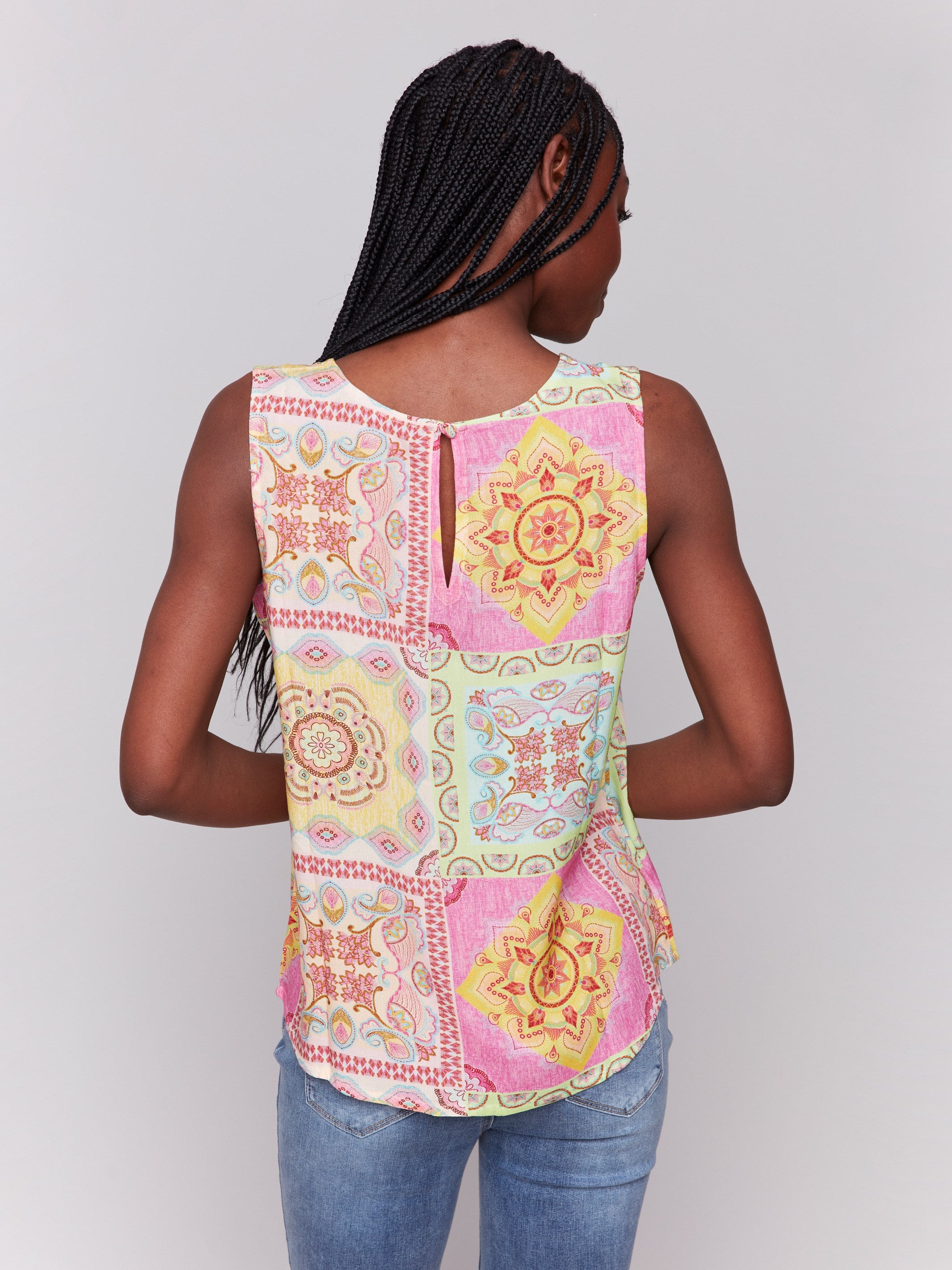 Stylish sleeveless top with geometric pattern and crew neckline by Charlie B.
