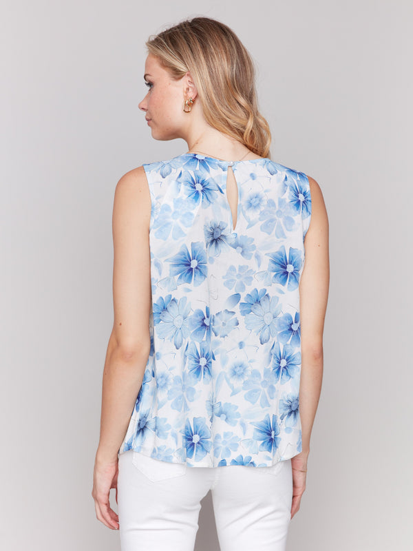 Sleeveless design featuring celestial botanical patterns by Charlie B.