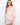 Blouse with wide elbow sleeves and a relaxed fit, featuring an abstract pink and white pattern with v-neck by Charlie B.