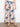 These cropped length pants feature vibrant floral patterns, adding a playful touch to your wardrobe. By Charlie B.