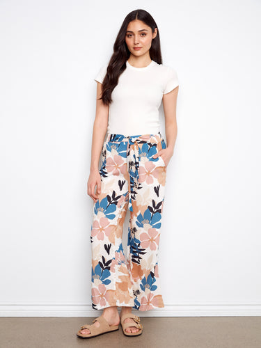Stylish floral pants offering both elegance and functionality with their unique design elements. By Charlie B.