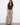 These pants feature a wide leg design, adding a flowy and relaxed look to your outfit. By Charlie B.