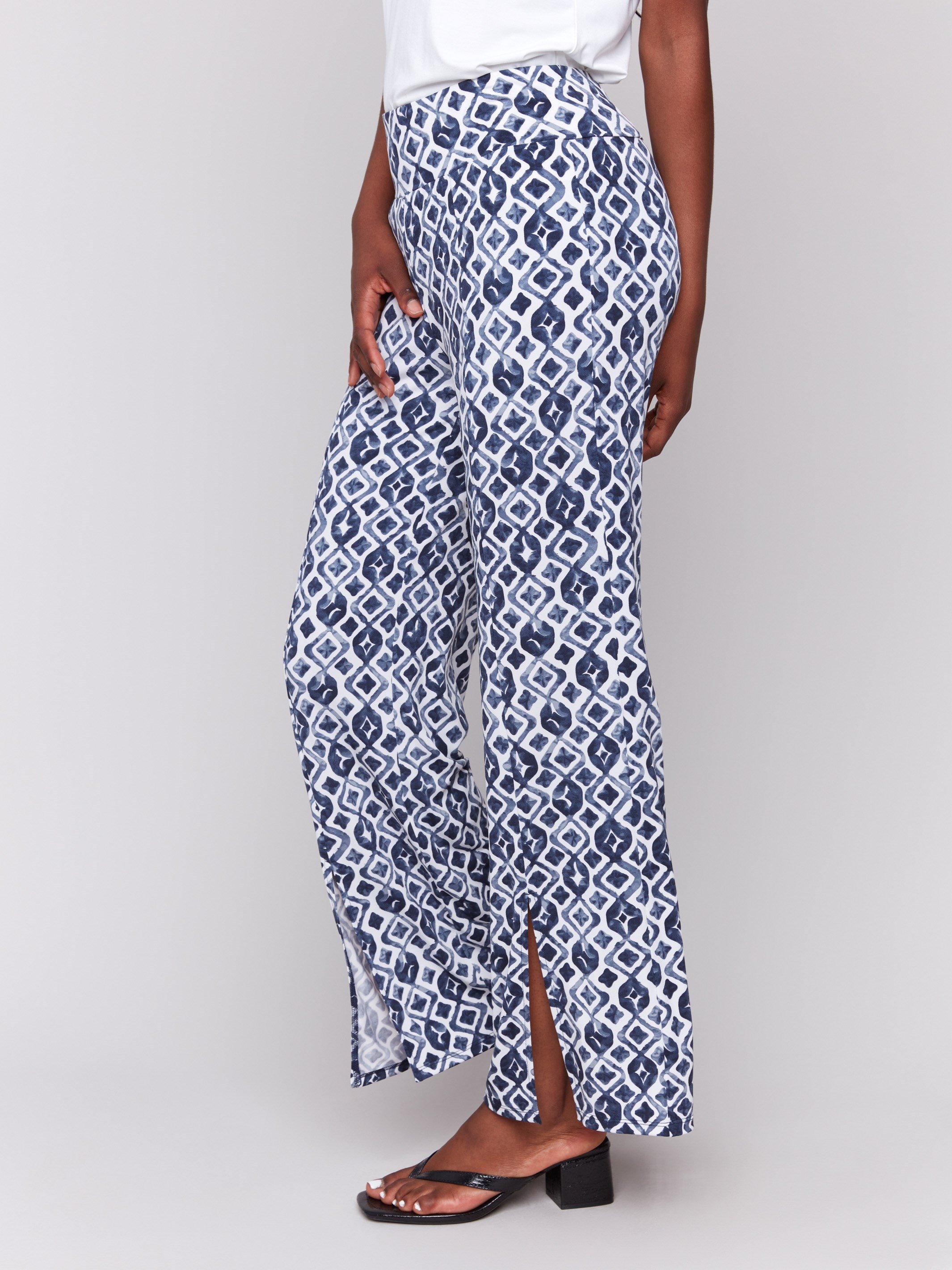 Geometric arabesque print pants designed in stretch fabric by Charlie B.