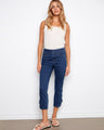 Denim pants with a slim leg silhouette, featuring a chic bow detail at the hem for added style by Charlie B.