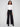 Black pants featuring a wide leg design for a chic silhouette, ideal for versatile styling by Charlie B.