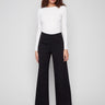 Black pants featuring a wide leg design for a chic silhouette, ideal for versatile styling by Charlie B.