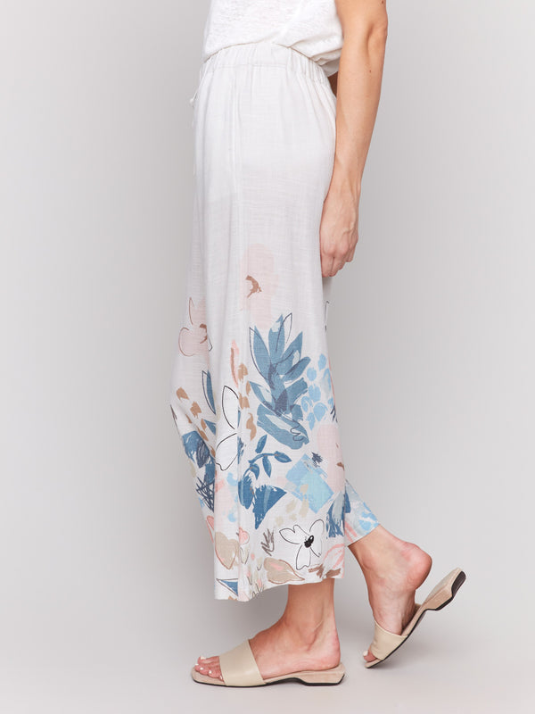 Regular rise linen pants with colorful floral print and drawstring waistband by Charlie B.