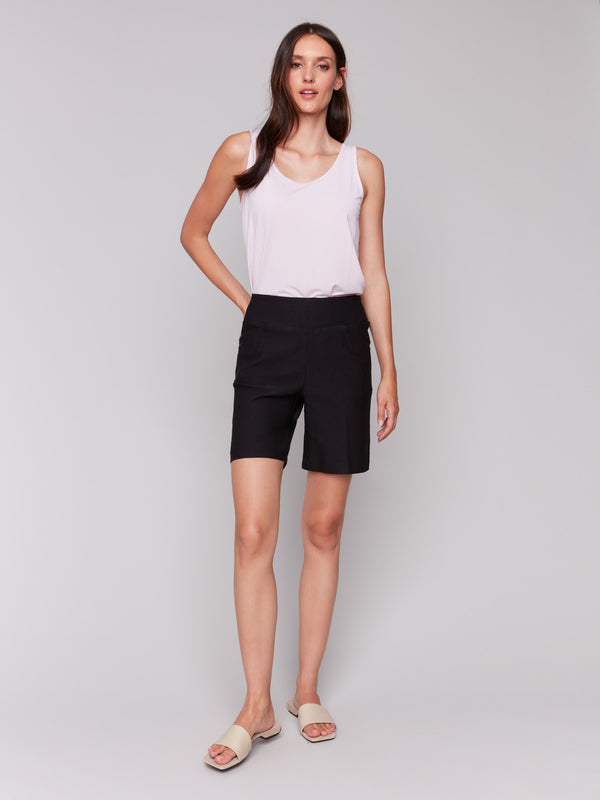 Sophisticated pull-on black shorts in sleek style by Charlie B.