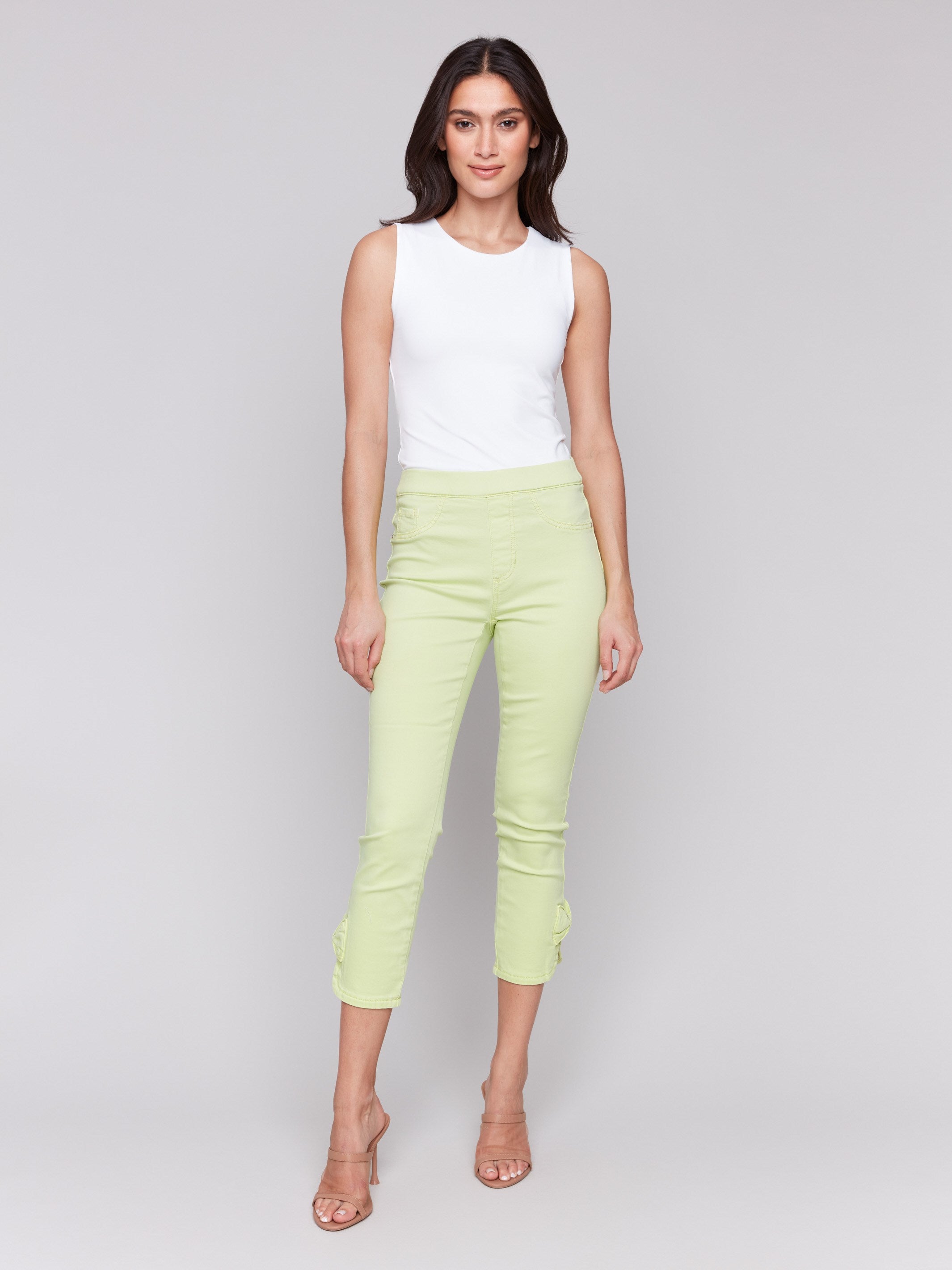 Light green pants featuring a slim leg design, ideal for versatile styling by Charlie B.