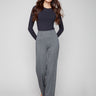 Black pull-on pants with a wide leg and elegant front dart detailing by Charlie B.
