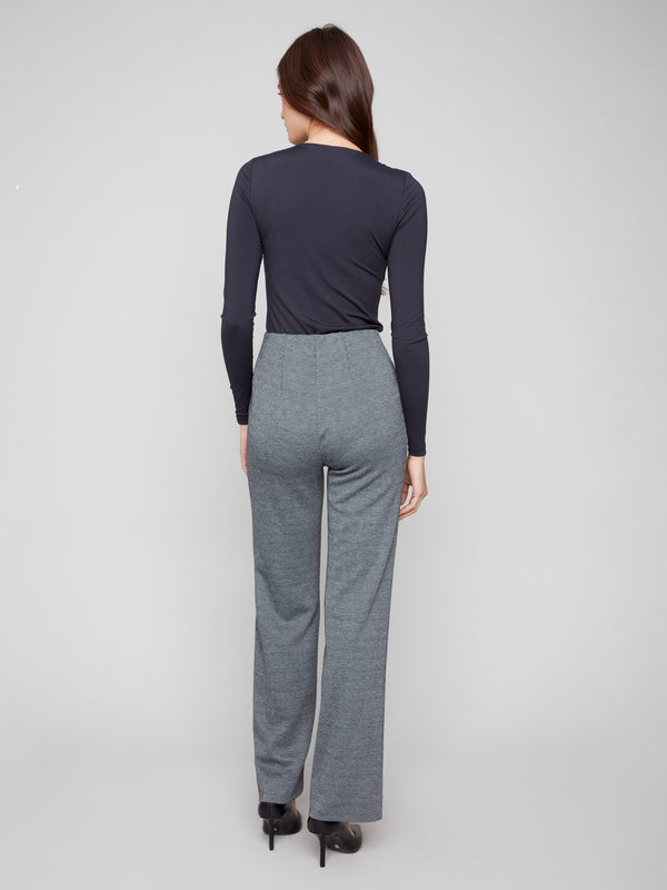 Sophisticated black pants designed with a flattering silhouette and elastic waist by Charlie B.