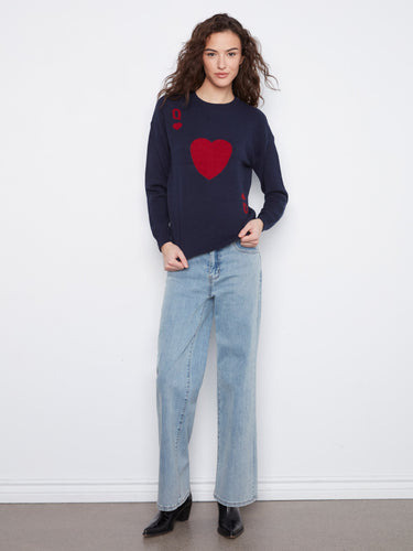Classic navy sweater with long sleeves adorned by heart motifs in red, offering a cozy and stylish fit by Charlie B.