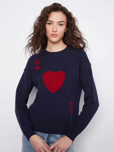 Stylish navy sweater highlighted by its crew neckline and playful red heart pattern, perfect for casual outings by Charlie B.