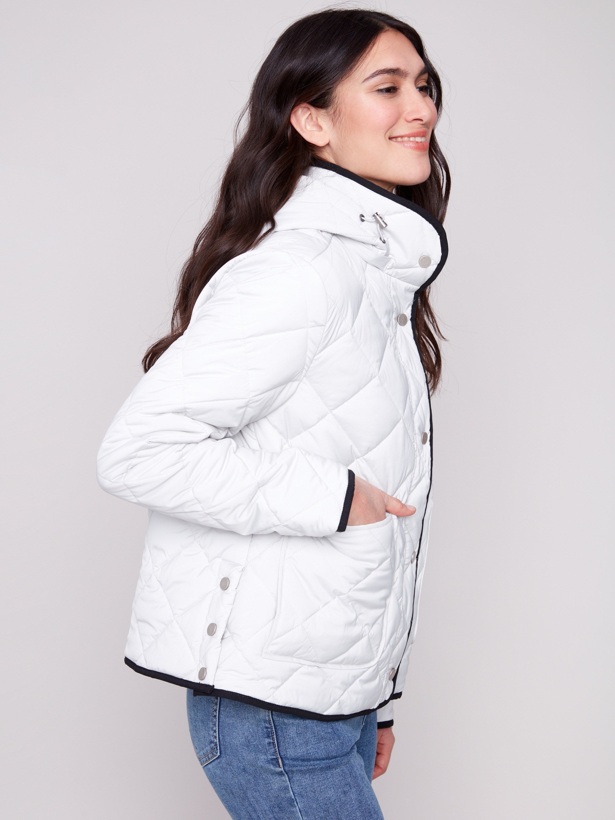 Stylish almond puffer jacket with snap button hem closure by Charlie B.