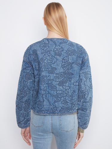 Crafted from 100% Tencel, this denim jacket provides a soft feel while maintaining its chic appearance by Charlie B.