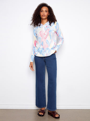 Experience cozy style with this artistic print hoodie, blending comfort and creativity effortlessly by Charlie B.