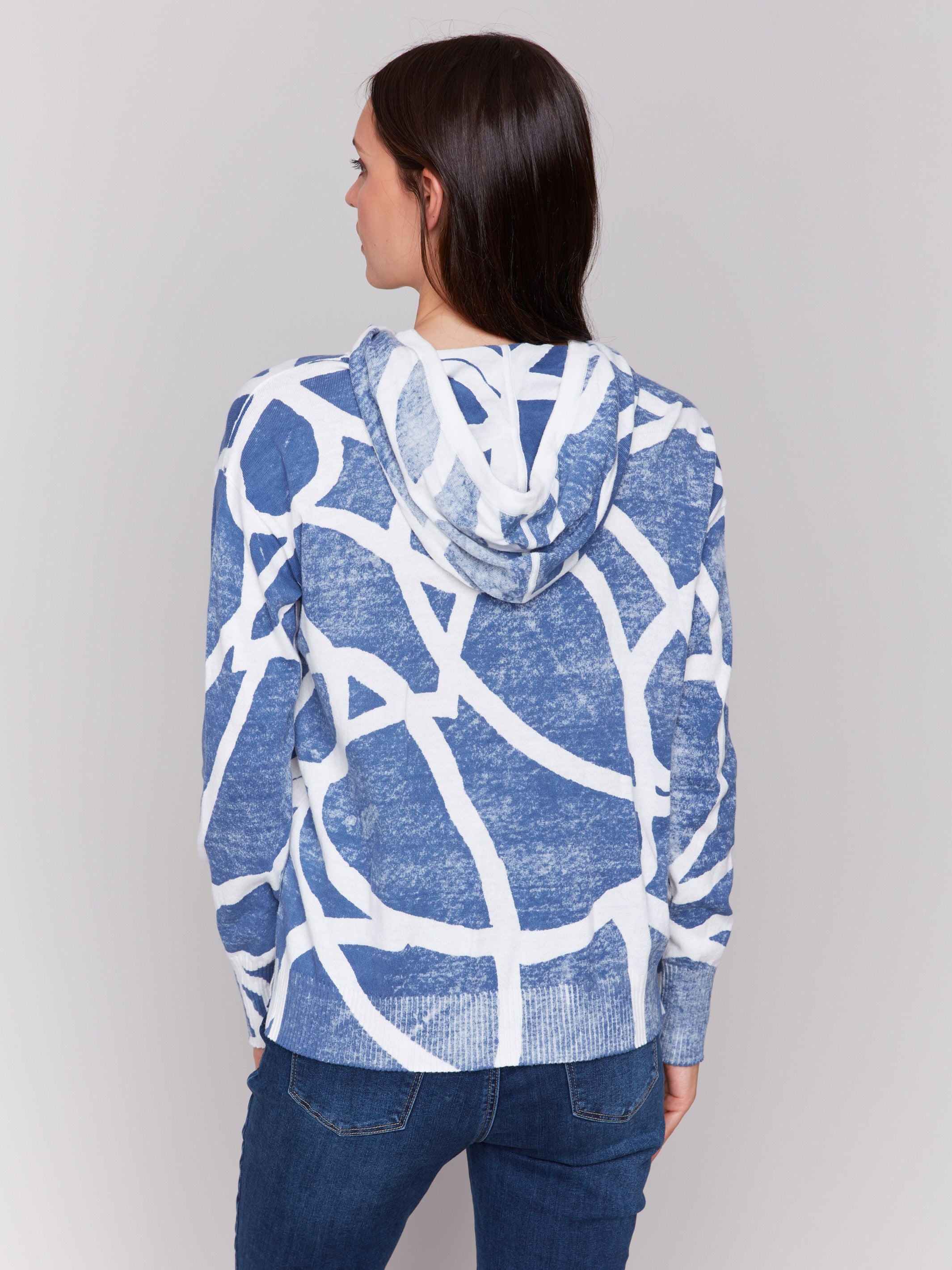 Sweater with an abstract reverse pattern and drawstrings by Charlie B.