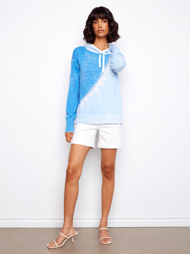 This stylish hoodie features a distinctive reverse print design on premium 100% cotton fabric, making it a wardrobe essential by Charlie B.