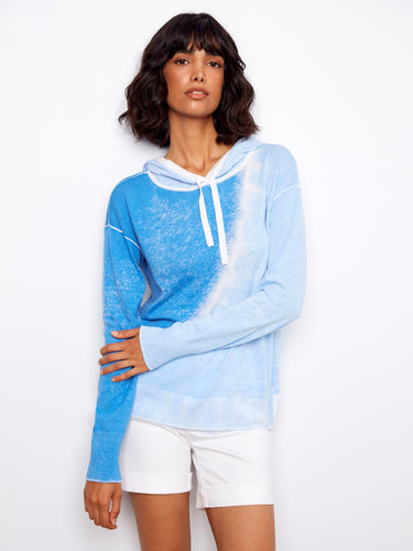 Experience ultimate comfort with this 100% cotton hoodie, showcasing an eye-catching reverse print design. A must-have piece by Charlie B.