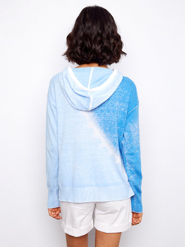 Elevate your casual look with this 100% cotton hoodie, featuring a striking reverse print design that adds flair to any outfit by Charlie B.