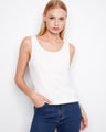 White tank top with a reversible design, featuring a scoop neck and relaxed fit. Perfect for versatile styling by Charlie B.