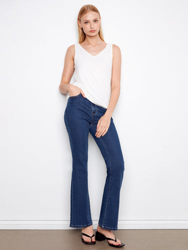Chic white tank top with a reversible feature and V-neck, offering comfort in its relaxed fit by Charlie B.
