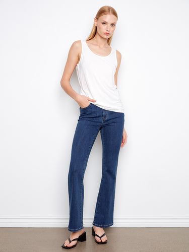 Stylish white tank top designed with a scoop neck and relaxed fit, perfect for layering or standalone wear by Charlie B.