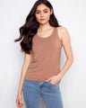 This top features a reversible design for versatile styling, perfect for any occasion. Crafted with care and elegance by Charlie B.